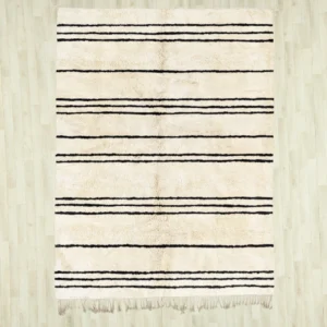 Handmade Beni Ourain rug with classic black and white horizontal stripes, showcasing traditional Moroccan craftsmanship. Perfect for adding a touch of minimalistic elegance and warmth to any living space