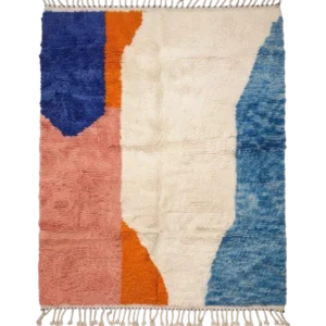 Colorful Beni Ourain rug with cobalt blue, orange and blush abstract color fields on natural cream wool
