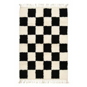Black and white checkered Beni Ourain rug with large squares and fringes, hand-knotted wool